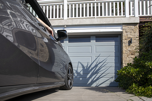 car in front of garage